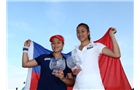 EASTBOURNE, ENGLAND - JUNE 21:  Hao-Ching and Yung-Jan Chan of Chinese Taipei pose with the trophy after beating Martina Hingis of Switzerland and Flavia Pennetta of Italy during their Women's Doubles Finals match on day eight of the Aegon International at Devonshire Park on June 21, 2014 in Eastbourne, England. (Photo by Jan Kruger/Getty Images)